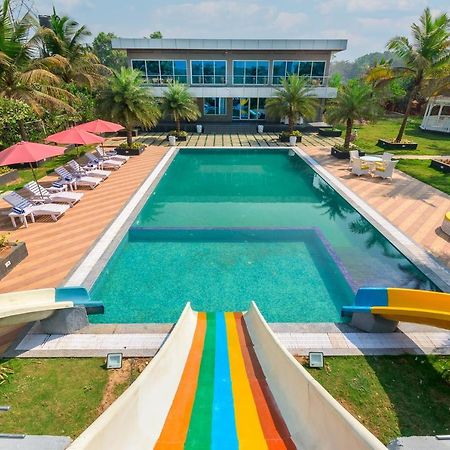 Saffronstays Palm Paradise, Kalyan Khadavli - Swimming Pool With Water Slides, Gazebo And Indoor Games Padghe Экстерьер фото