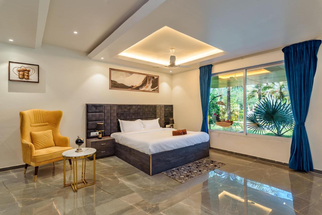 Saffronstays Palm Paradise, Kalyan Khadavli - Swimming Pool With Water Slides, Gazebo And Indoor Games Padghe Экстерьер фото