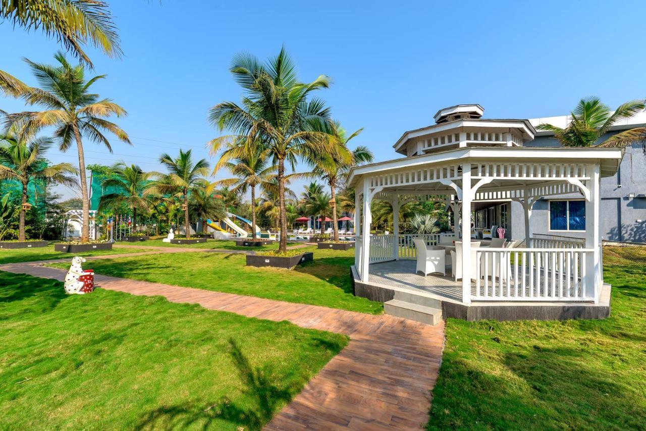 Saffronstays Palm Paradise, Kalyan Khadavli - Swimming Pool With Water Slides, Gazebo And Indoor Games Padghe Экстерьер фото