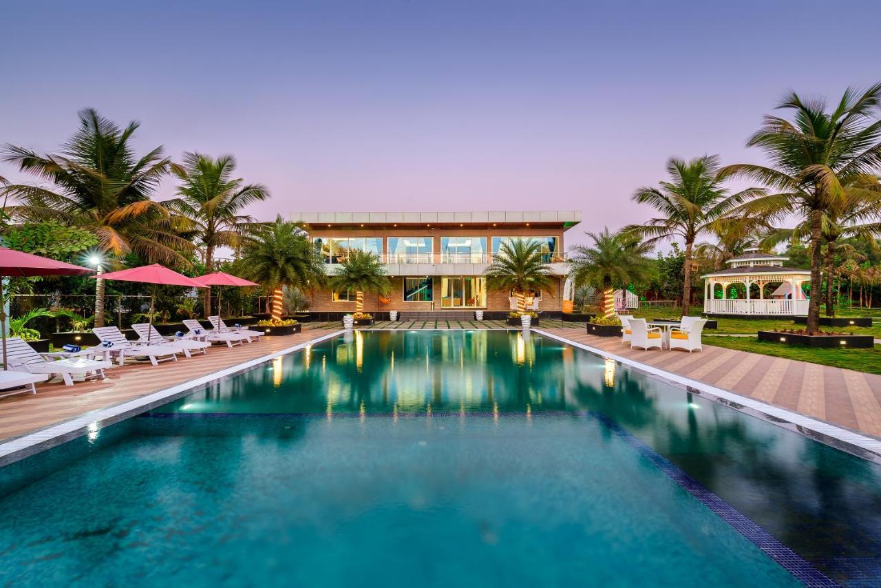 Saffronstays Palm Paradise, Kalyan Khadavli - Swimming Pool With Water Slides, Gazebo And Indoor Games Padghe Экстерьер фото